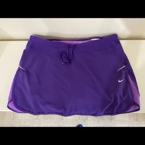 Purple Nike Dri-Fit running shorts